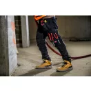MILWAUKEE FREEFLEX™ Univerzálne pracovné nohavice čierne 245 g/m² / 60 W44/L32